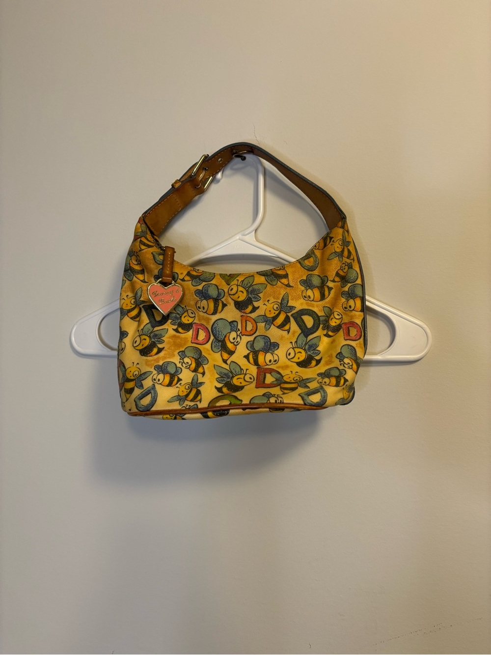 Dooney and Bourke Vintage Yellow Bee-Print Shoulder Bag with Heart Charm Accent